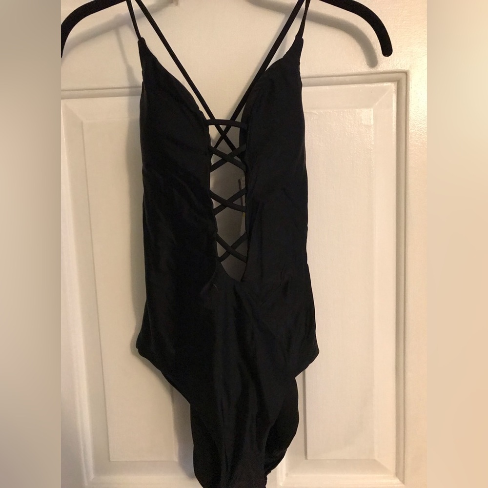 Black BECCA by Rebecca White bathing suit. Brand new with tags!